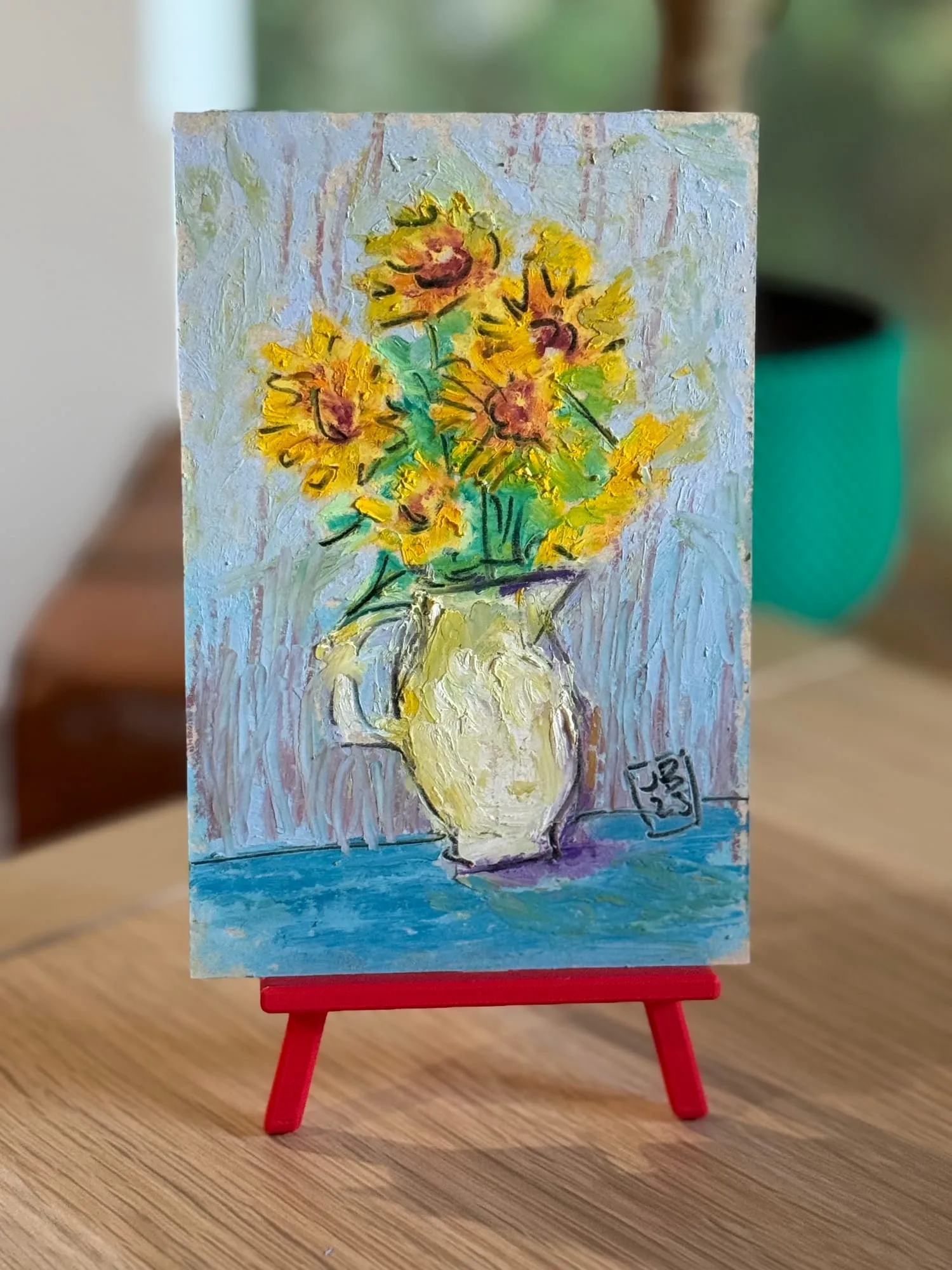 Girasoles en la jarra — la pieza en el caballete del estudio