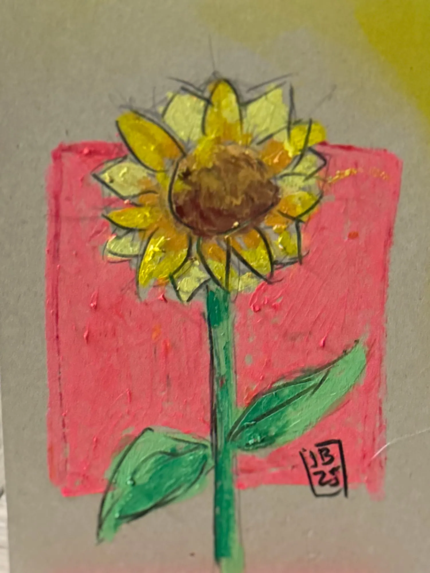 Un girasol de tallo verde sobre un cuadrado rosado, óleo pastel