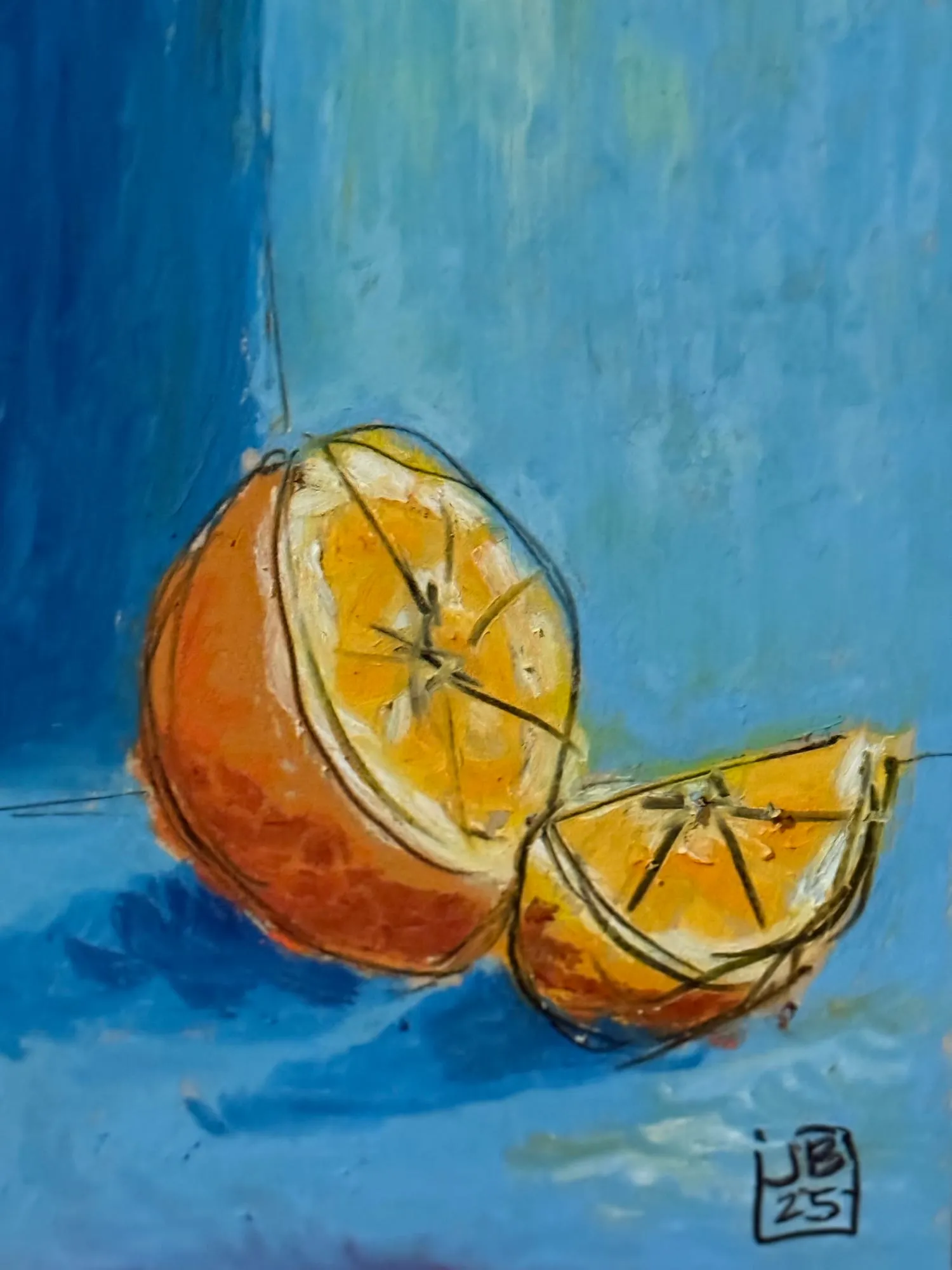 Media naranja y un cuarto sobre fondo azul, óleo pastel