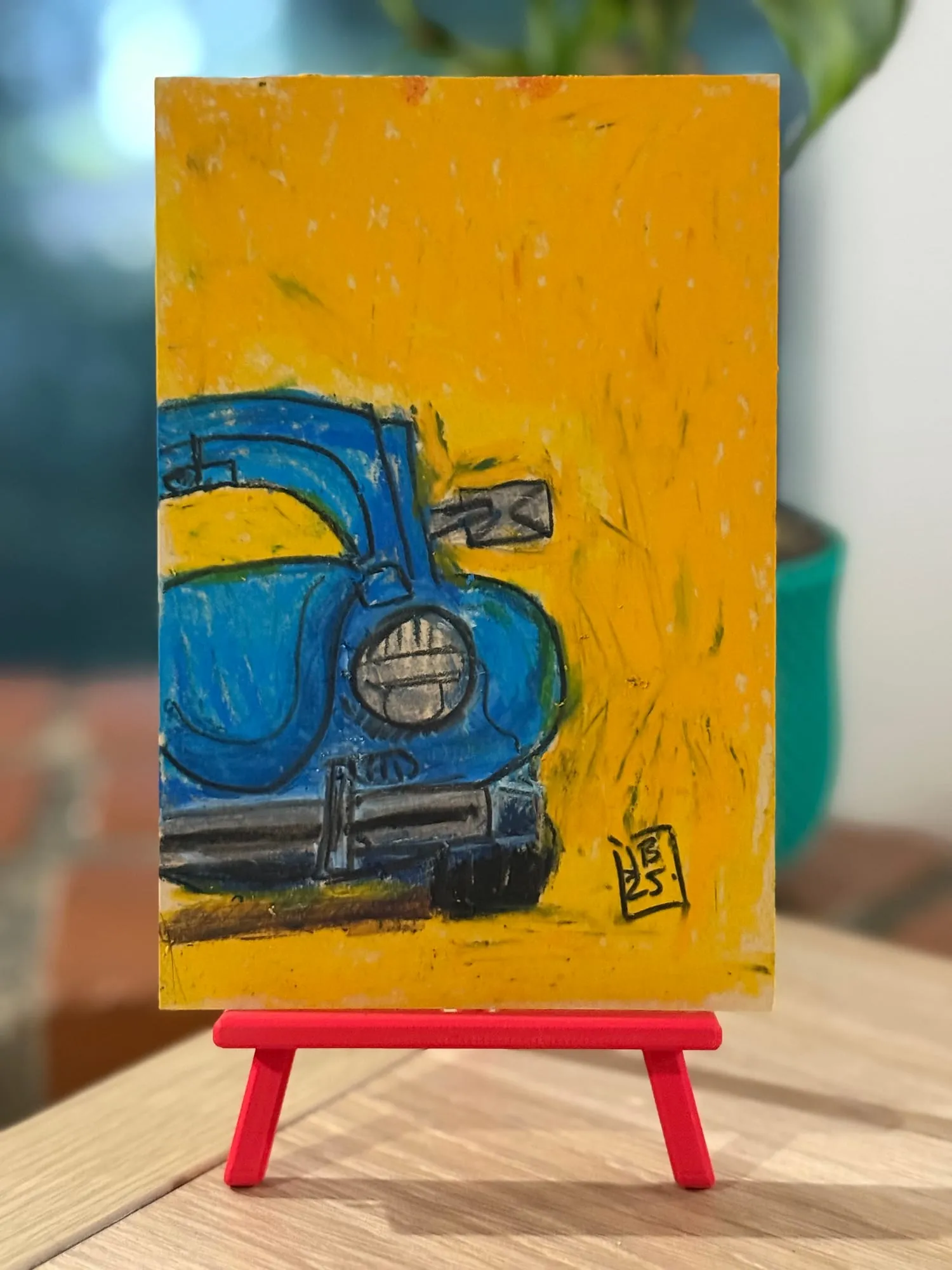 Escarabajo azul — la pieza en el caballete del estudio