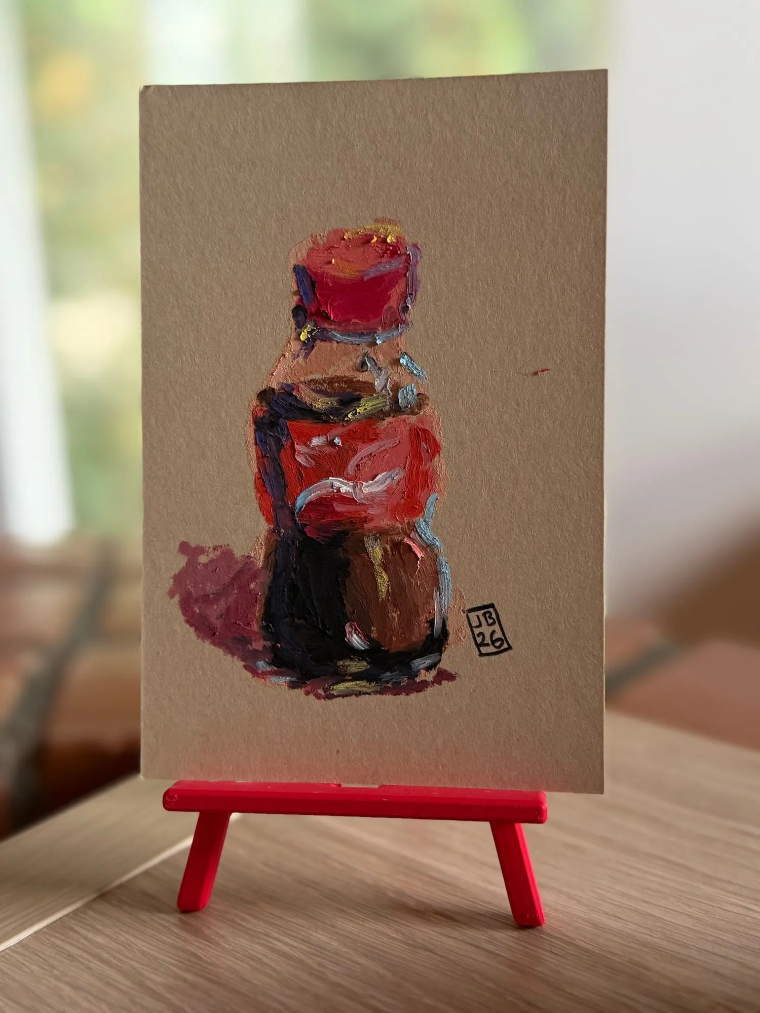 Botella de Coca-Cola — la pieza en el caballete del estudio